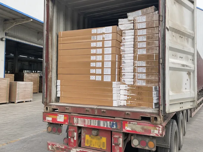 KD flat-pack aluminum commercial doors loaded in export cartons for container shipping