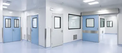 Cleanroom-rated specialty doors for pharmaceutical and semiconductor manufacturing facilities