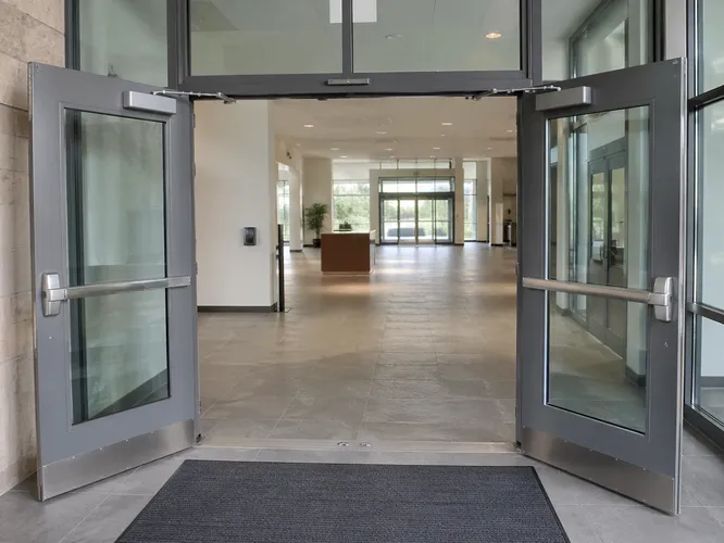 Steel double leaf commercial door — wide-opening configuration for lobbies and institutional entrances