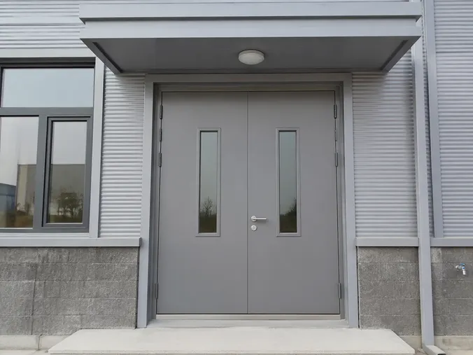 EUWOO exterior commercial steel door — factory-direct, weather-sealed, high-traffic building entrance