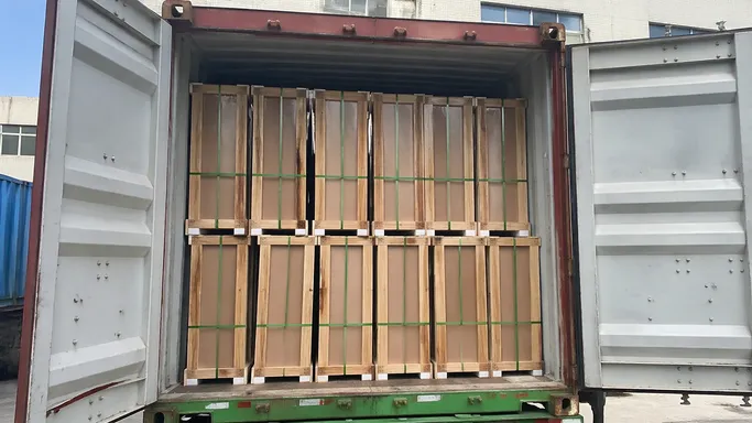 Container loading configuration for glass commercial doors — wooden crate packaging ready for export