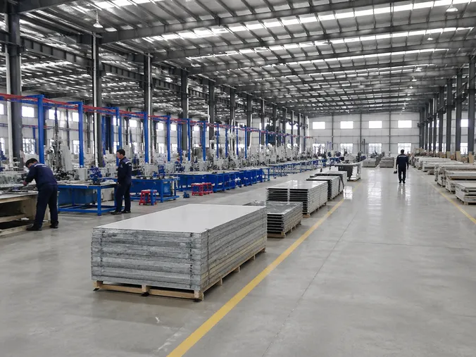 EUWOO commercial doors manufacturing facility — 18,000 m² production floor with 6 dedicated lines