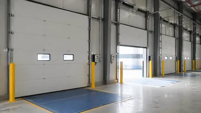 Heavy-duty commercial doors installed in a warehouse distribution center
