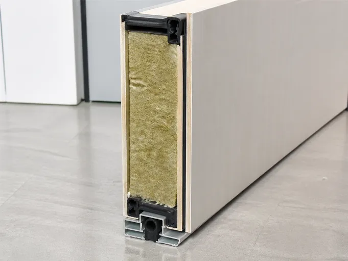 Cross-section of acoustic interior commercial door showing mineral wool core and EPDM seals