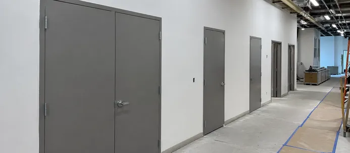 Metal doors in commercial construction and fit-out project