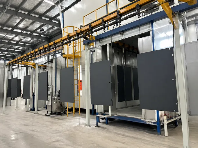 Automated electrostatic powder coating line for metal doors