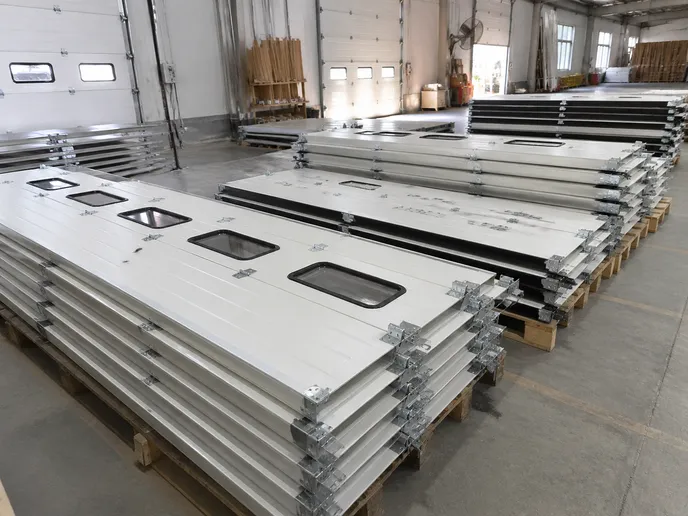 Custom warehouse door configurations including vision panels and hardware prep