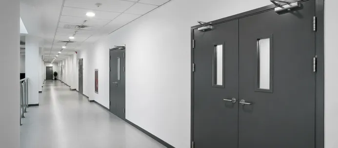 Commercial fire doors installed in office corridor