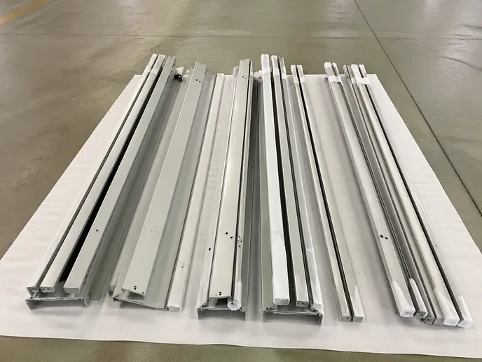 Knock-down fire door frame components laid flat for export shipping
