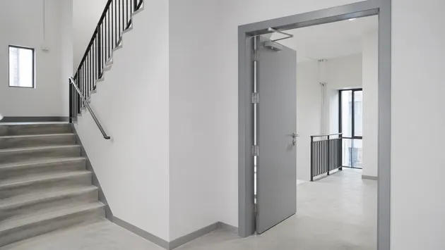 Fire door frames installed in new commercial construction stairwell