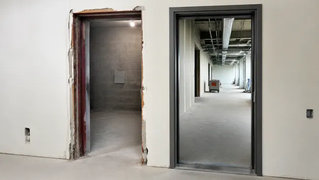 Retrofit fire door frame replacement in existing building upgrade