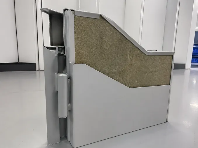 Cross-section of 1.5mm SPCC industrial fire door body showing reinforced hinge pocket and mineral wool core