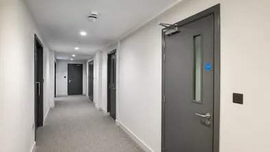Interior fire door replacement for facilities management retrofit and building fire safety upgrade