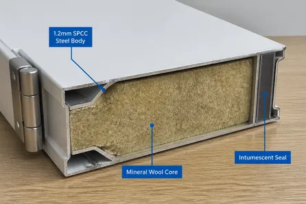 Office fire door cross-section detail — 1.2mm SPCC steel body, mineral wool core, intumescent seal