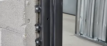 Security door frame anchor point construction detail