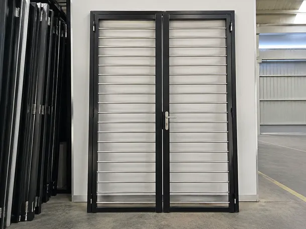 Double leaf security grill door 1200x2000mm commercial shopfront configuration
